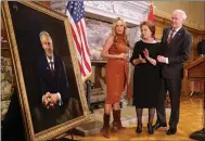  ?? Thomas Metthe/Arkansas Democrat-Gazette ?? Gov. Asa Hutchinson (from right), first lady Susan Hutchinson and their daughter, Sarah Wengel, look at the governor’s new portrait, which was unveiled on Tuesday, Jan. 3, at the state Capitol in Little Rock.