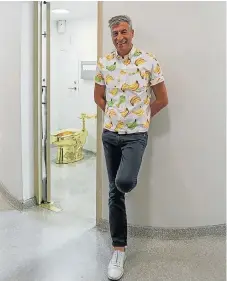  ?? /Instagram ?? Subversive display: Italian artist Maurizio Cattelan in front of his sculpture, America, a 18-carat gold toilet. The piece is a bold statement on the excess of art and the wealthy.