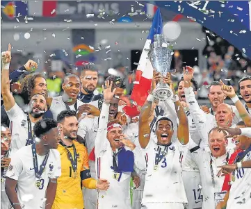  ?? AFP ?? French players celebrate after winning the Nations League final beating Spain at San Siro stadium in Milan on Sunday.