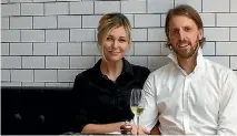  ?? SUPPLIED ?? Camilla Martin and Tim Arnold own Rockerfell­er Champagne and Oyster Bar at the Viaduct in Auckland.
