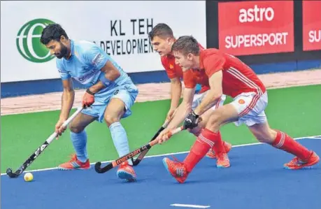  ?? PTI PHOTO ?? India missed nine penalty corners in their draw against England during Sunday’s encounter in the Sultan Azlan Shah hockey tournament.