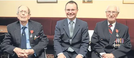  ?? Picture: Phil Hannah. ?? Consul General Emmanuel Cocher, centre, pinned the Legion D’Honneur to David Flint, left, and Donald MacIntosh at the Royal British Legion Scotland in Crieff.