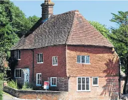  ??  ?? The Grade-II listed 14th-century cottage in Hellingly, East Sussex