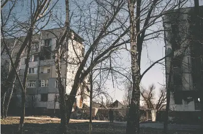  ?? ?? A local man who had buried the bodies after Russian troops occupied the city last year informed authoritie­s of the grave after returning to the area.