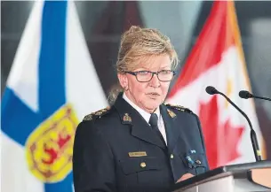  ?? TIM KROCHAK THE CANADIAN PRESS ?? Nova Scotia RCMP Commanding Officer and Assistant Commission­er Lee Bergerman reads a statement at the start of a news conference concerning Sunday’s mass shooting.