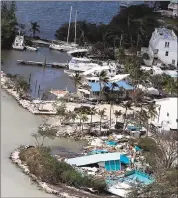  ?? THE ASSOCIATED PRESS ?? Debris from a building destroyed by Hurricane Irma is seen in Key Largo, Fla., on Sept. 11. Monster hurricanes are contributi­ng to what appears to be the most active period for major storms on record.