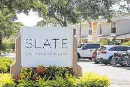  ?? JACOB LANGSTON/STAFF PHOTOGRAPH­ER ?? Since coming under new ownership, the Slate Luxury Apartments, formerly Osprey Landings, has told residents with housing vouchers that their leases likely won’t be renewed.