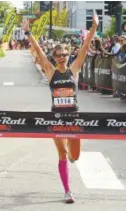  ?? Helen H. Richardson, Denver Post file ?? Monica Folts wins the the women’s race of the Denver Rock ‘N’ Roll Marathon in 2014.