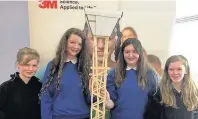  ??  ?? Woodbrook Vale School’s Year 8 and 9 team with their Titanic Tower entry into the Tower Tech Challenge as part of the 2017 Young Innovators Challenge.