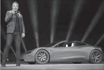  ?? HAWTHORNE
-AP ?? Tesla CEO Elon Musk unveils the Roadster 2 during a presentati­on in California, USA.