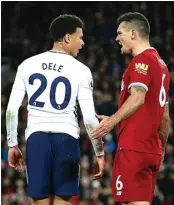  ?? ANDREW YATES/REUTERS ?? NAKAL: Dele Alli bersitegan­g dengan Dejan Lovren kemarin.