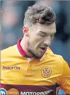 ??  ?? CHIPPING IN: Motherwell’s Craig Clay