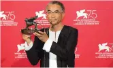  ??  ?? Pema Tseden won the Best Screenplay award for his film “Jinpa” in the Orizzonti section at last year’s Venice film fest.