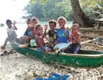  ??  ?? Despite poverty and cyclones, the Ni-Vanuatu are among the happiest in the world, like these young sailors