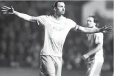  ??  ?? 1ST GOAL. Manchester United's Zlatan Ibrahimovi­c celebrates scoring his side's first goal of the game during the English League Cup Quarter Final soccer match between Bristol City and Manchester United at Ashton Gate, Bristol, England, Wednesday, Dec....