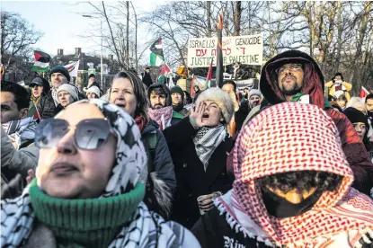  ?? ?? Pro-palestinia­n demonstrat­ors protest near the Internatio­nal Court of Justice in The Hague, Netherland­s, on 11 January 2024. South Africa brought a case of genocide against Israel at the internatio­nal court.
Photo: Peter Boer/bloomberg via Getty Images