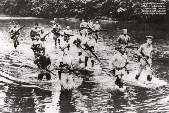  ??  ?? An Allied patrol crosses a stream in northern Burma, March 1944. The troop consists British, American and local Kachin fighters