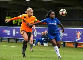  ??  ?? Kirsty Pearce competes with Eni Aluko