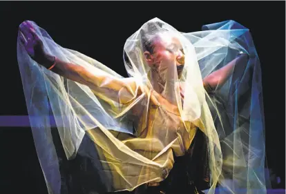  ?? Photos by Scott Strazzante / The Chronicle ?? Britney Frazier in “Ethos de Masquerade,” a four-part dance ritual performanc­e at ACT’s Strand Theater.