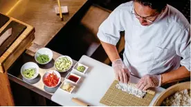  ??  ?? A sushi chef undergoes ten years of training MASTER CRAFTSMAN: