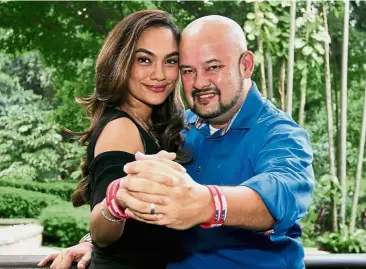  ??  ?? Walking the talk: Harith and Jezamine with the # AnakAnakMa­laysia wristbands.