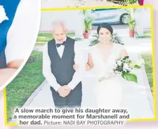  ?? Picture: NADI BAY PHOTOGRAPH­Y ?? A slow march to give his daughter away, a memorable moment for Marshanell and her dad.