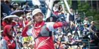  ?? WORLDARCHE­RY.ORG ?? DINGIN: Riau Ega Agatha Salsabila (kanan) dan Diananda Choirunisa saat melawan pasangan Korsel Chang Hye-jin/Kim Woo-jin pada Archery World Cup (AWC) di Shanghai, Tiongkok, pekan lalu.