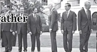  ?? AGENCE FRANCE PRESSE ?? President Joe Biden talks with Sultan of Brunei Haji Hassanal Bolkiah during a family photo for the U.S.-ASEAN Special Summit on the South Lawn of the White House on May 12, 2022 in Washington, DC.