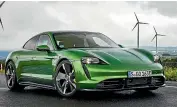  ??  ?? Sexiest car: How sexy is the Porsche Taycan? It even looks good in bright metallic green, that’s how sexy it is.