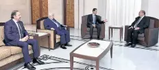  ?? OFFICIAL SYRIAN ARAB NEWS AGENCY ( SANA) ?? Syrian President Bashar al- Assad ( C) and Foreign Minister Walid Muallem ( 2nd- L) meeting the new Ambassador of Lebanon to Syria Saad Zakhia ( R) in the Syrian capital Damascus .