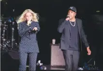  ?? MATT ROURKE / AP FILE (2016) ?? Beyonce and Jay-z, performing as the Carters, are nominated for their video “Apes**t.” The two are shown performing in Cleveland in 2016.