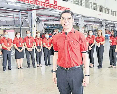  ??  ?? Mr Korkij and all staff are making an effort to keep Thailand Post as one of the top three players in the country’s package delivery market.