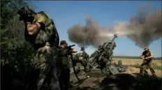  ?? The New York Times ?? Ukrainian soldiers fire a U.S.-supplied M777 howitzer at a Russian position on June 21 in the Donetsk region of Ukraine. The kind of European war thought inconceiva­ble in Ukraine — one that relies on heavy use of artillery and tanks — is depleting stockpiles of artillery and ammunition as the conflict speeds toward the 10-month mark.