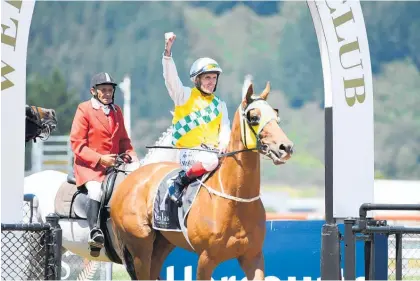  ?? Photo / Race Images ?? Jason Waddell punches the air in triumph after winning the Gr.1 Thorndon Mile (1600m) aboard Shadows Cast in January.