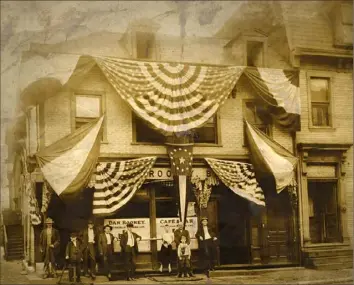  ?? Heinz History Center ?? When he was 12, Art Rooney Sr.’s father, Daniel, bought this building along General Robinson Street, pictured here in 1918, on the North Side. It became Dan Rooney Cafe and Bar on the first floor while the second and third floors were the family’s home. Art Rooney Sr. would live the rest of his life in the neighborho­od.