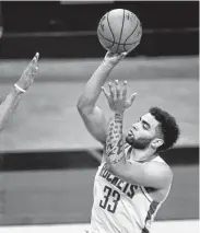  ?? Mark Mulligan / Staff photograph­er ?? Forward Anthony Lamb played 24 games for the Rockets last season on a two-way contract.