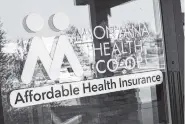  ?? THE ASSOCIATED PRESS ?? The offices of the Montana Health Co-op are in Helena, Mont. The co-op will resume accepting new enrollees today.