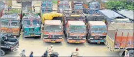  ?? SAMEER SEHGAL/HT PHOTO ?? ▪ Trucks are parked in Amritsar on Friday. The transporte­rs demand relief from rising costs sparked by diesel price hike, toll fee, third party insurance and national permits for passenger vehicles.