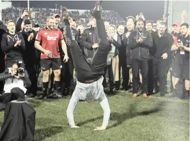  ??  ?? ON CLOUD NINE: Scott Robertson celebrates with a break dance routine after his Crusaders team won their ninth Super Rugby title in Christchur­ch on Saturday. AP