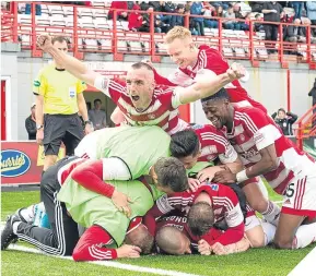  ??  ?? ■ Overjoyed Accies players celebrate their secoUd.