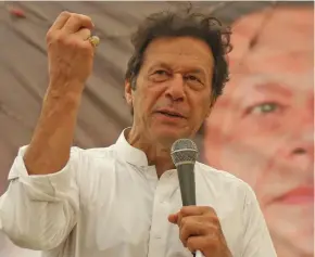  ??  ?? Pakistani cricketer-turned-politician Imran Khan claimed victory in Pakistan elections.