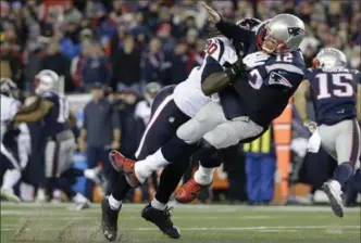  ?? ASSOCIATED PRESS FILE PHOTO ?? Houston Texans defensive end Jadeveon Clowney levels New England Patriots veteran quarterbac­k Tom Brady during the first half of their National Football League divisional playoff game Jan. 14.