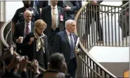  ?? J. SCOTT APPLEWHITE - THE ASSOCIATED PRESS ?? Vice President Mike Pence, center, joined at left by Dr. Deborah Birx, the coronaviru­s response coordinato­r, arrives at the Capitol to brief House members on the COVID-19 outbreak, in Washington, Wednesday, March 4.