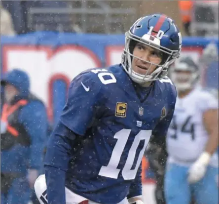  ?? BILL KOSTROUN - THE ASSOCIATED PRESS ?? New York Giants quarterbac­k Eli Manning reacts after losing a fumble to the Tennessee Titans during the second half of an NFL football game, Sunday, Dec. 16, 2018, in East Rutherford, N.J.