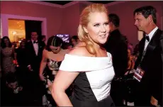  ?? DANNY MOLOSHOK / REUTERS ?? Comedian Amy Schumer arrives at the 73rd Golden Globe Awards in Beverly Hills, California.