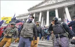  ?? MANUEL BALCE CENETA AP FILE ?? Evidence presented at trial shows the Oath Keepers group’s leader messaged the Proud Boys leader during the Capitol riot on Jan. 6, 2021.