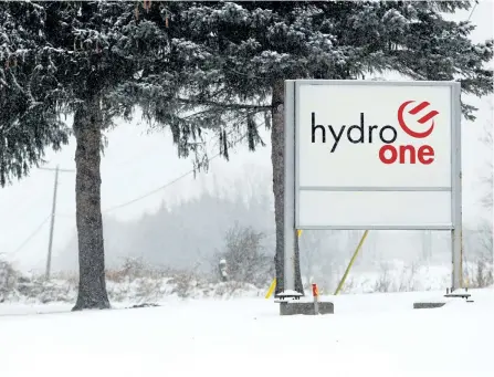  ?? POSTMEDIA NETWORK FILES ?? A sign marks the property outside the Hydro One office in Tweed, Ont. Taxpayers would have saved $1.8 billion if the Ontario government had taken on traditiona­l debt to fund infrastruc­ture projects instead of partially privatizin­g Hydro One to pay for...