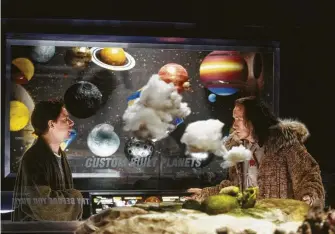  ?? Laurie Sparham / Touchstone Pictures ?? Martin Freeman, left, as Arthur Dent and Bill Nighy as Slartibart­fast in a scene from the 2005 film adaptation of Douglas Adams’ “The Hitchhiker’s Guide to the Galaxy.”