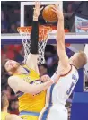  ?? SUE OGROCKI/ASSOCIATED PRESS ?? Nuggets center Jusuf Nurkic (23) reaches up to block a shot by Oklahoma City’s Domantas Sabonis (3).