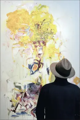  ?? PICTURE: EPA-EFE ?? A visitor looks at the artwork (1969) by American artist Joan Mitchell at the internatio­nal art show Art Basel, in Basel, Switzerlan­d, this week.